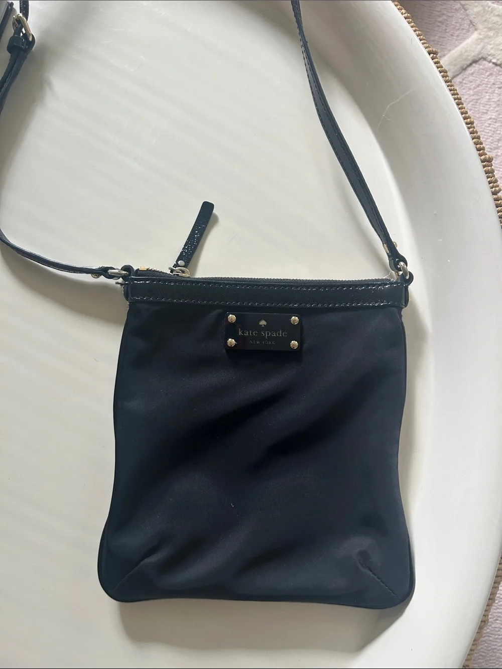 kate spade black crossbody with gold hardware